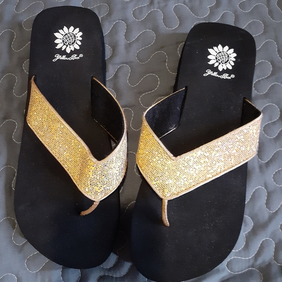 yellow box gold flip flops